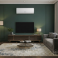 Gree AC in Dark Green Living Room with DARCOM Logo